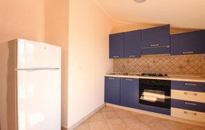 Fridge, oven, coffee/tea maker, cookware/dishes/utensils