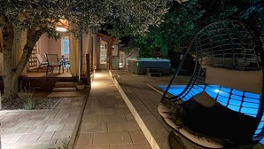 A patio area with a pool, outdoor seating, and a hot tub. - Gorgeous home in Pula with WiFi (Pula)