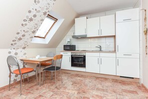 Fridge, coffee/tea maker, electric kettle, toaster
