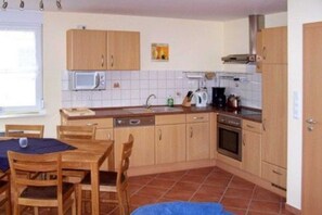 Fridge, oven, dishwasher, high chair