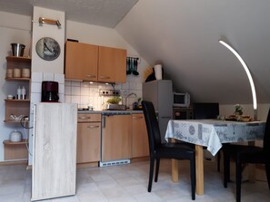 Fridge, microwave, oven, high chair