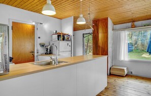 Fridge, stovetop, coffee/tea maker