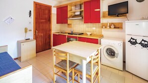 Private kitchen - Beautiful apartment in Lido delle Nazioni FE with swimming pool (Lido delle Nazioni FE)