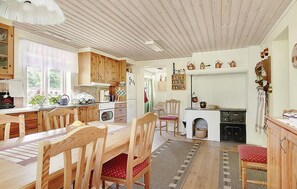 Fridge, stovetop, dishwasher, coffee/tea maker