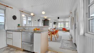 Fridge, stovetop, dishwasher, coffee/tea maker