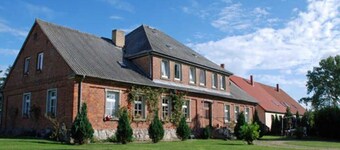 Apartment Rügen with fireplace - Apartments in the manor house Gnies