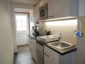 Fridge, coffee/tea maker, electric kettle, toaster