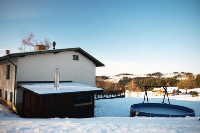 Holiday home with outdoor swimming pool and pergola