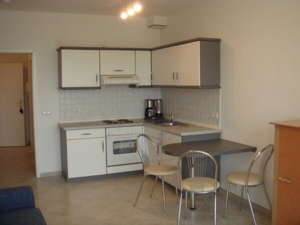 Imagen sin descripción, 1 de 12, botón