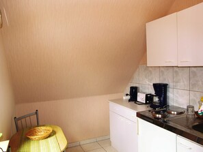 Fridge, coffee/tea maker, electric kettle, toaster