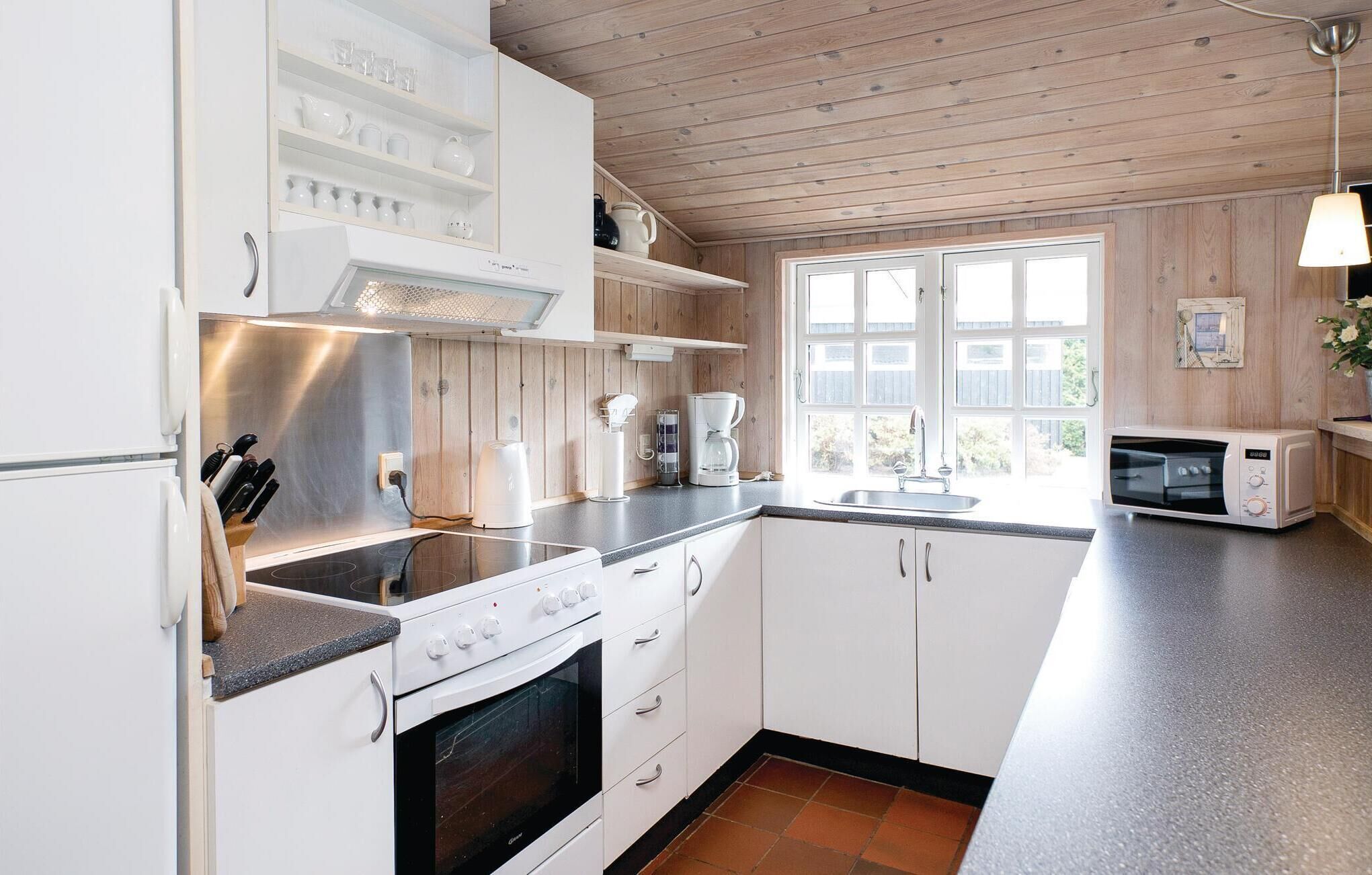 Geladeira, cooktop, lava-louças, cafeteira/chaleira