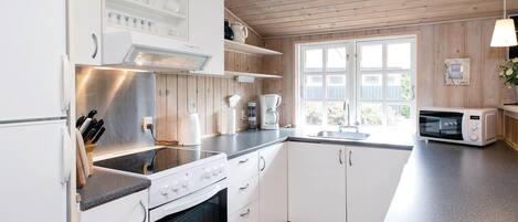 Réfrigérateur, surface de cuisson, lave-vaisselle, cafetiÚre-théiÚre