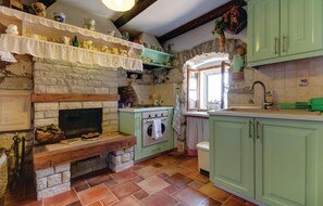 Fridge, stovetop, coffee/tea maker, cookware/dishes/utensils