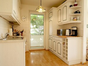 Fridge, microwave, dishwasher, coffee/tea maker