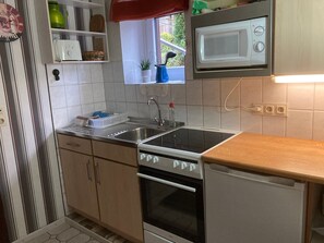 Fridge, microwave, oven, high chair