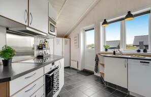 Frigorifero, piano cottura, lavastoviglie, macchina per tè/caffè