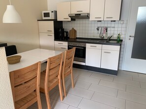 Fridge, oven, dishwasher, highchair