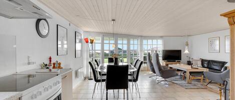 Fridge, stovetop, dishwasher, coffee/tea maker