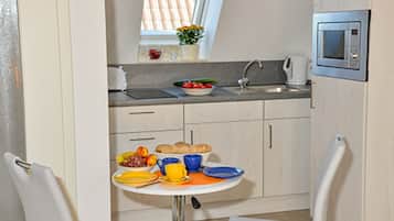 Fridge, microwave, coffee/tea maker, electric kettle