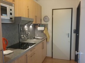 Fridge, microwave, high chair