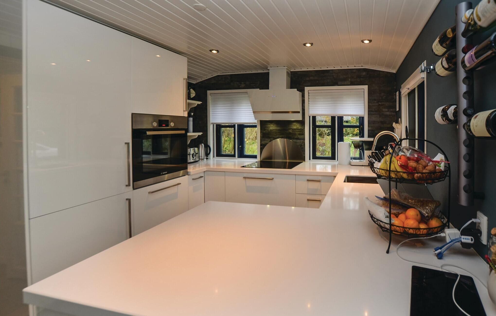 Fridge, stovetop, dishwasher, coffee/tea maker