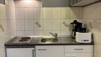 Fridge, coffee/tea maker, electric kettle, toaster