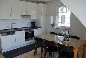 Fridge, oven, dishwasher, high chair