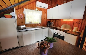 Fridge, stovetop, dishwasher, coffee/tea maker