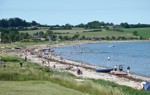 Guests can enjoy swimming, sunbathing, and boating in the ocean.