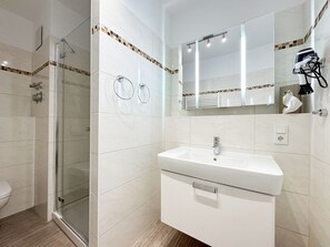 Chuveiro, secador de cabelo