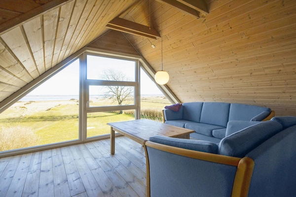 Télévision, cheminée, table de tennis de table