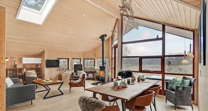 Lovely home in ørsted with sauna