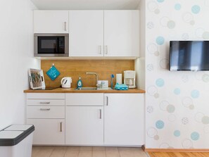 Fridge, microwave, highchair