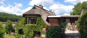 Ferienappartement Having - Holiday apartments under a thatched roof with lake view
