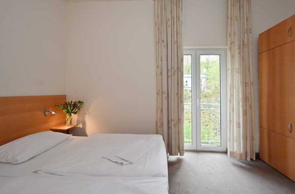 2 bedrooms, travel crib, WiFi, bed sheets