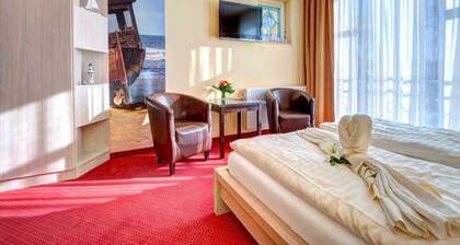 Comfort room with pantry kitchen - Aparthotel Strandhus Trivago Award Best 3