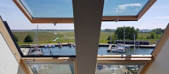 FEWO SEGELHAFENIDYLL, direkte u. ruhige Wasserlage, WLAN - Ferienwohnung