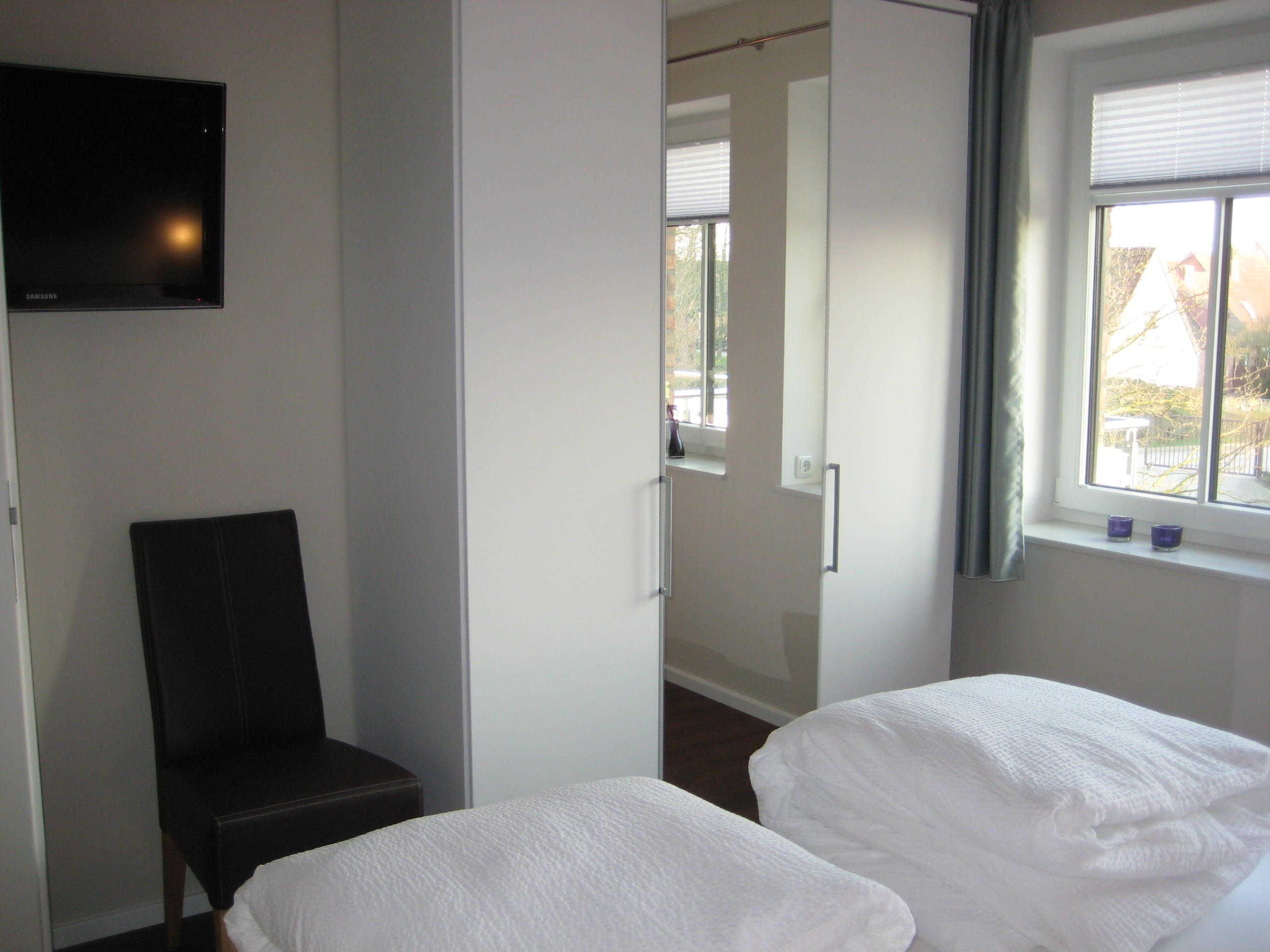 2 slaapkamers, een kluis op de kamer, reisbedje, wifi