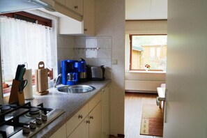 Fridge, microwave, coffee/tea maker, electric kettle