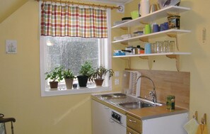 Fridge, stovetop, coffee/tea maker, cookware/dishes/utensils