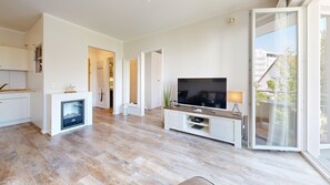 Flat-screen TV, fireplace