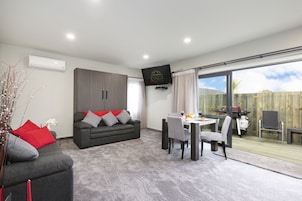 Superior Apartment, 1 Bedroom | Living area | Flat-screen TV