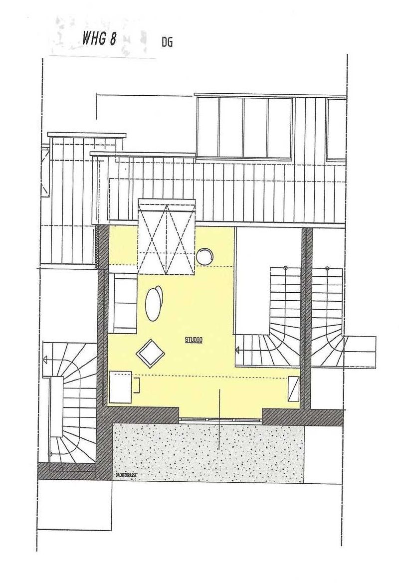 A floor plan with a studio area, a staircase, and a separate room labeled 'BACHTERBRUECKE'.