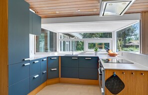 Fridge, stovetop, dishwasher, coffee/tea maker