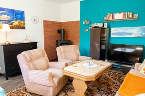 Fernseher, Kamin
