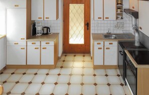 Fridge, stovetop, coffee/tea maker