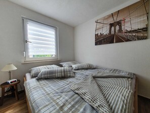 2 slaapkamers, een strijkplank/strijkijzer, wifi, beddengoed
