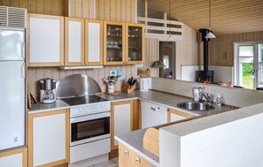 Fridge, stovetop, dishwasher, coffee/tea maker