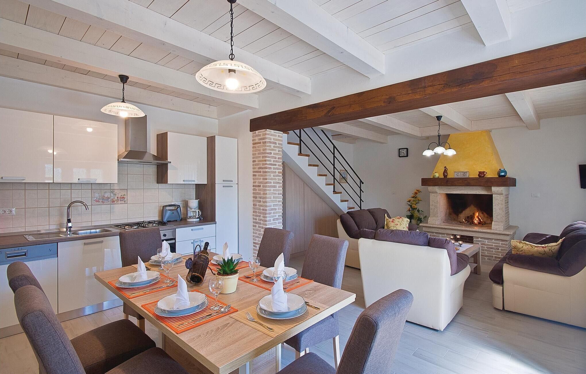 Fridge, stovetop, dishwasher, coffee/tea maker