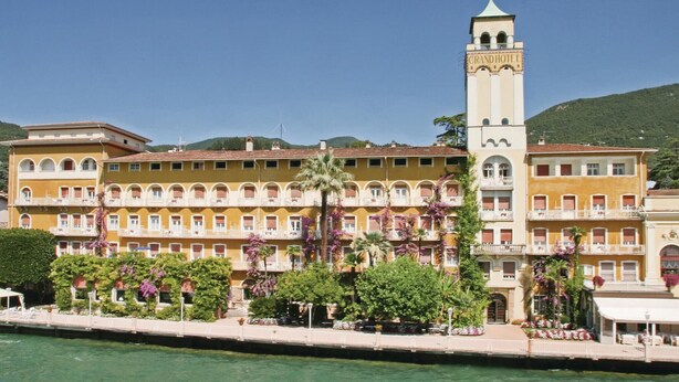 A large hotel with a prominent tower labeled "GRAND HOTEL" and a waterfront location. - Stunning home in Villanuova sul C. BS with outdoor swimming pool (Villanuova sul C. BS)